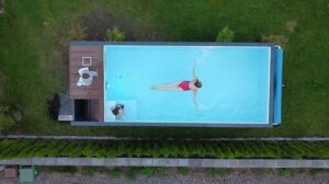 Containerpool 6,2 m x 2,5 m mit Gegenstromanlage, Sportbereich und Spa